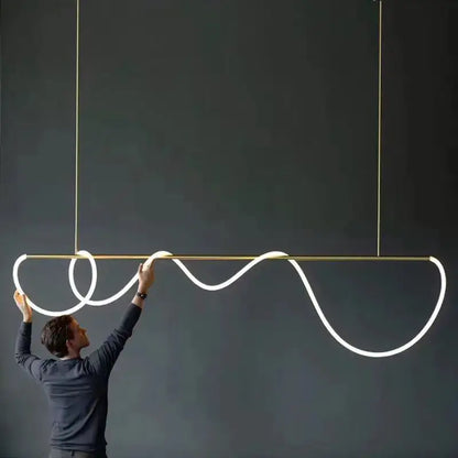 A decorbites™ contemporary led chandelier with a gold frame and white glowing long hose led for dining room lighting