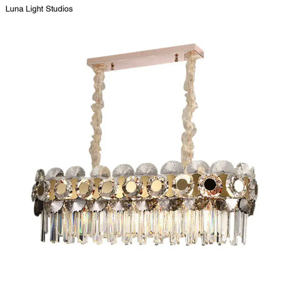 Elegant rose gold decorbites metal facing island chandelier with rectangular frame, crystal prisms, and twisted suspension chains