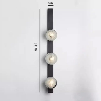 Black metal wall light with three frosted glass globes by DecorBites™ contemporary wall light for modern spaces