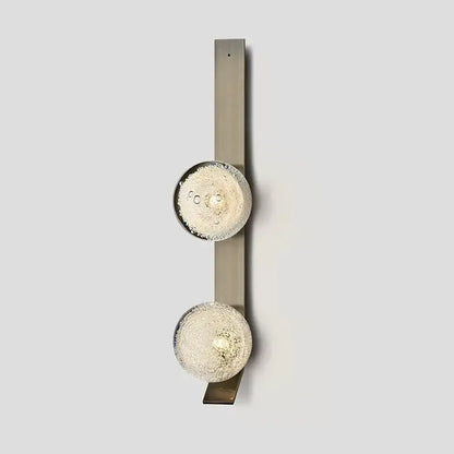 DecorBites™ contemporary wall light with two frosted glass orbs on a brushed metal vertical bar wall sconce