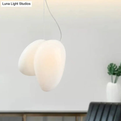 Cream-colored decorbites™ contemporary white glass pendant light with modern overlapping oval shapes for dining room ceiling 220v-240v 110v-120v
