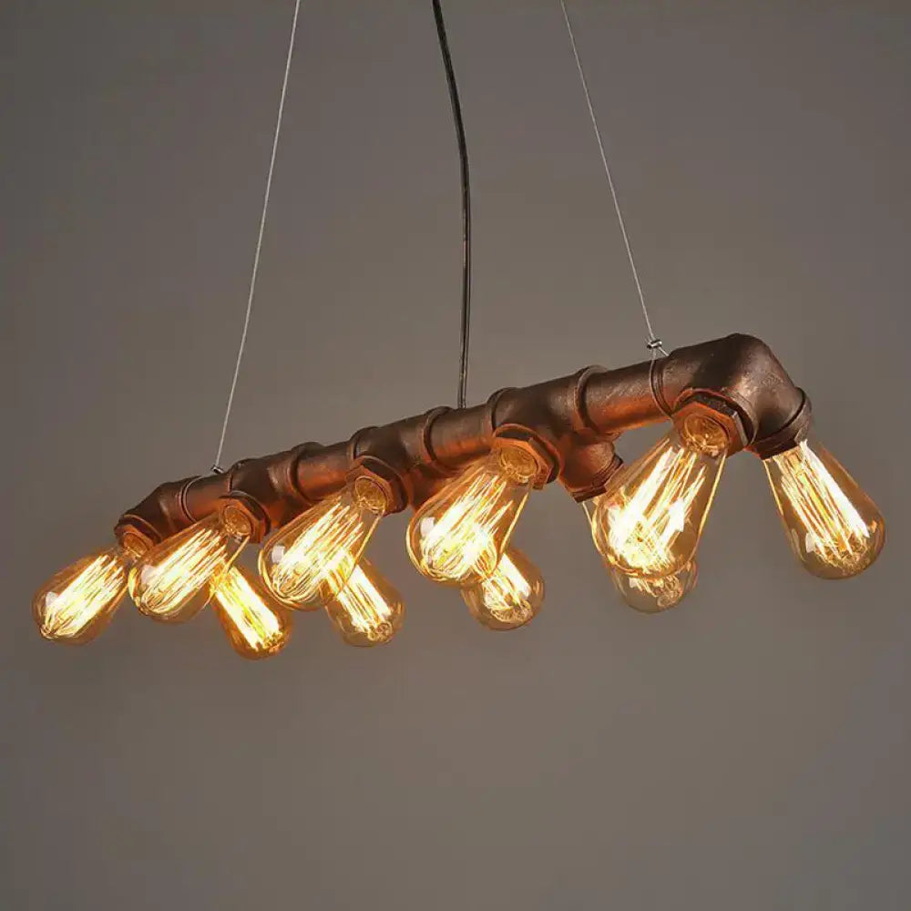 DecorBites copper and black industrial kitchen island light with symmetric piping and 10 glowing amber bulbs