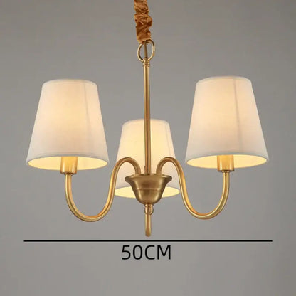 Brass-finished three-arm decorbites copper ceiling chandelier with cream fabric shades for living room lighting