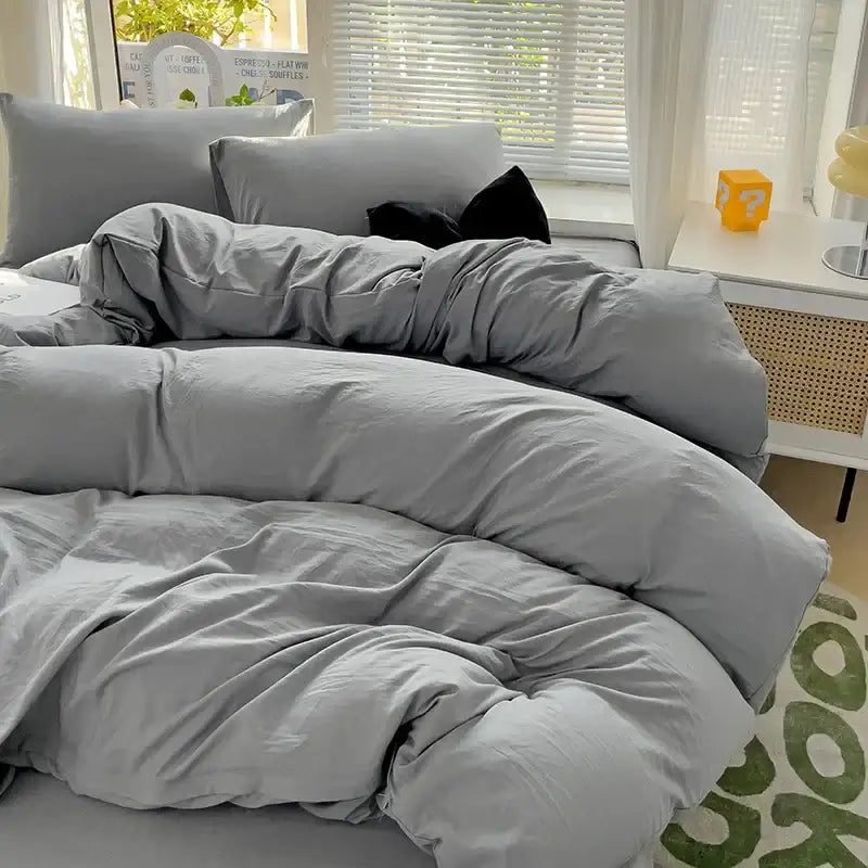 Decorbites cotton bedding set featuring a cozy plush gray cotton duvet cover with matching pillowcases and sheet