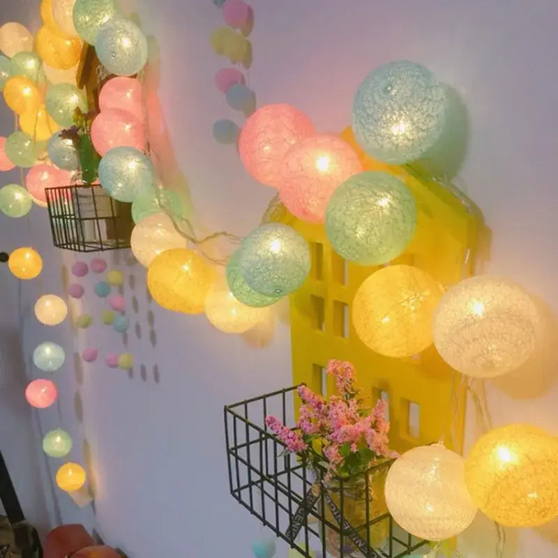 Pastel-colored decorbites™ cotton garland led string lights with textured translucent spherical cotton garland material