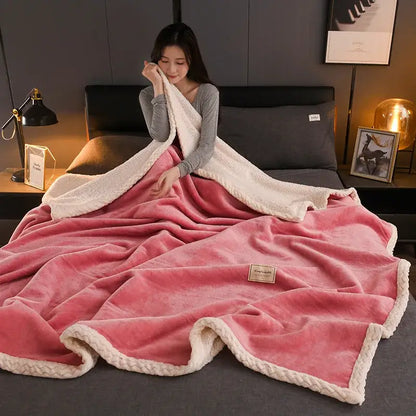 Pink plush blanket with cream braided fleece border from decorbites cozy autumn gray and white living room throw collection
