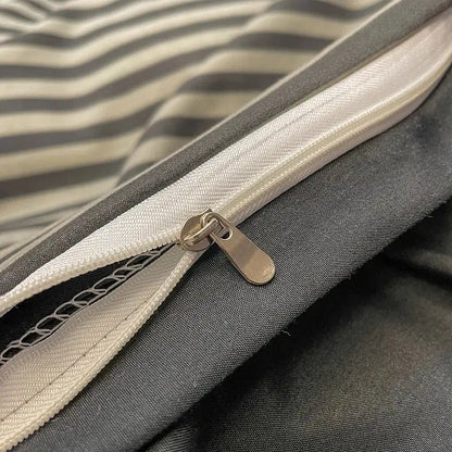 Silver-toned zipper with metallic pull tab on decorbites™ cozy nordic plaid 1pc duvet cover and 1pc flat sheet fabric