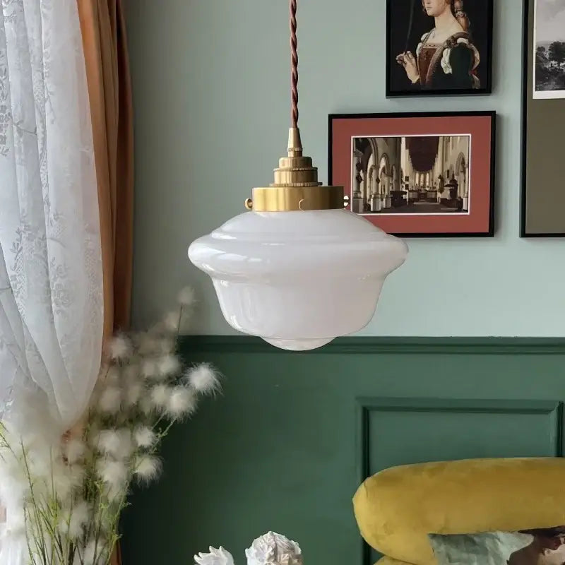 Decorbites cream glass pendant light with frosted white glass shade brass hardware and twisted brown cord for kitchen lighting