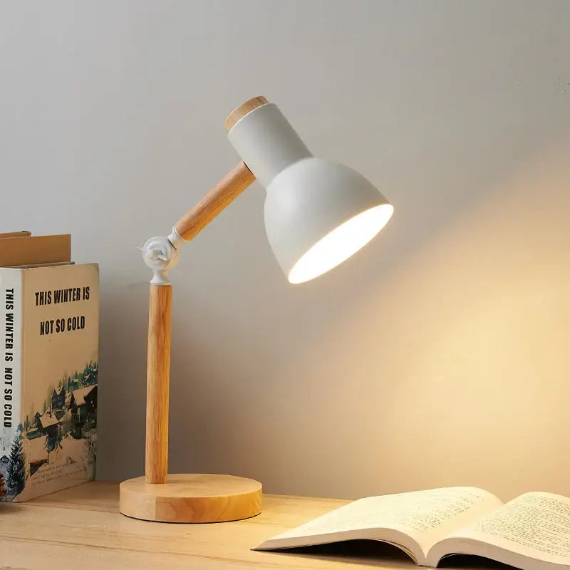 White metal creative nordic table lamp with wooden base and articulated arm for bedside and study use