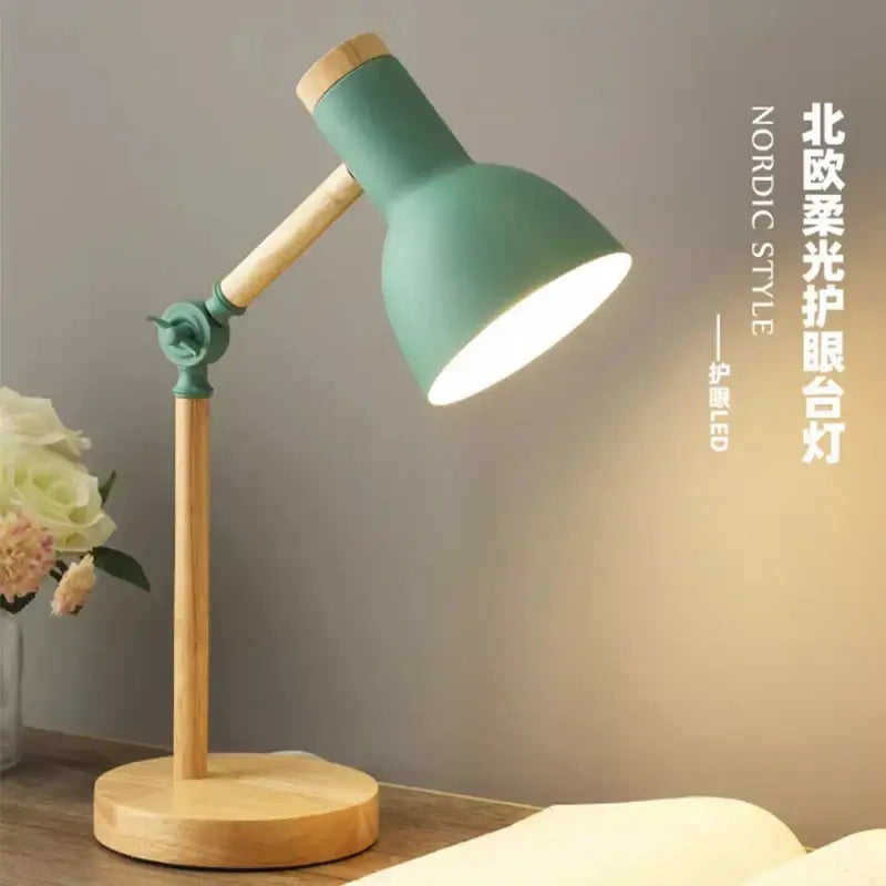 A mint green creative nordic table lamp with wooden base and articulated arm featuring eye protection led bulb