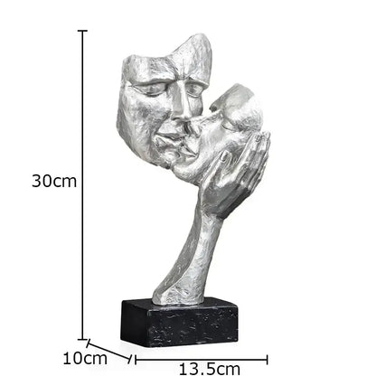Silver metallic decorbites creative thinker modern sculpture of two faces in embrace on a black base desk decor