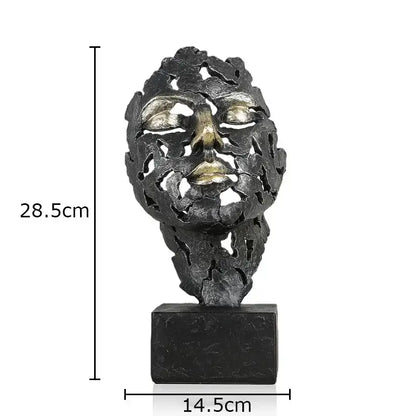 Decorbites creative thinker modern sculpture in dark carved face design with gold-toned eyes and lips on black base
