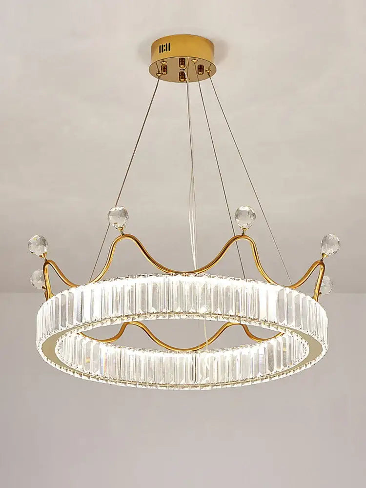 Gold-toned decorbites crown petal led chandelier with clear crystal accents for elegant bedroom lighting