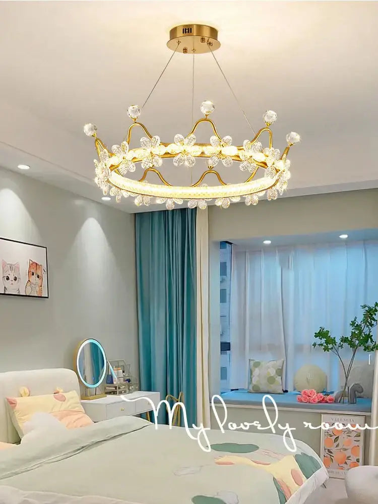 Gold chandelier shaped like a crown with crystal accents and LED lighting for bedroom decorbites crown petal led design