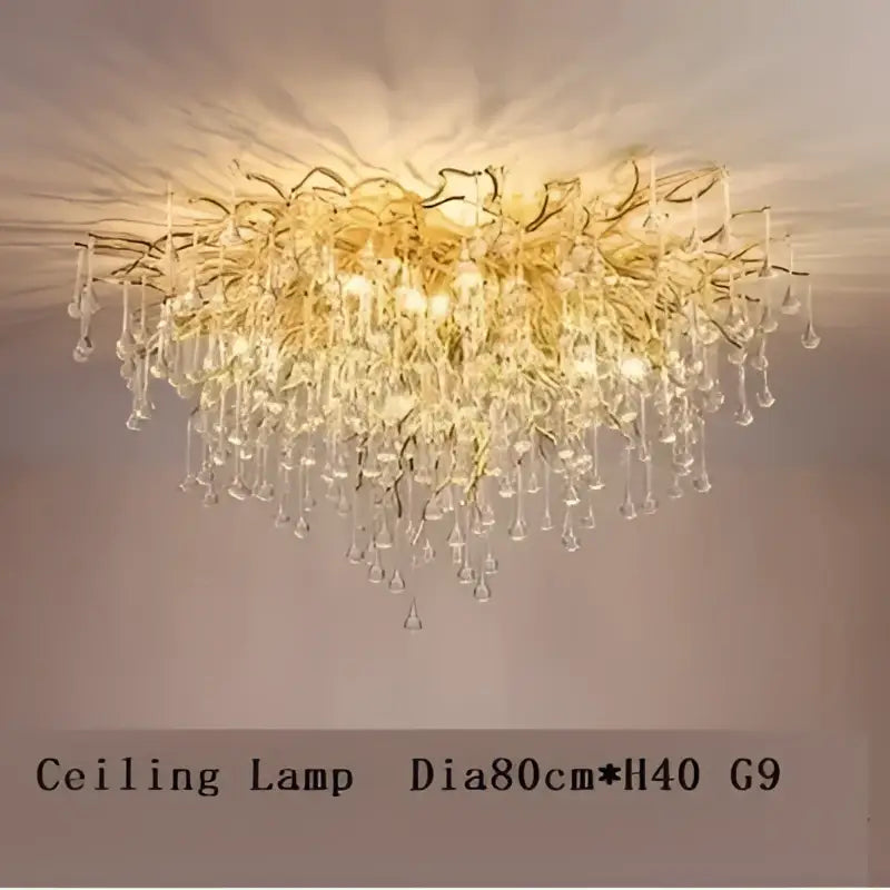 Gold-toned decorbites crystal branch chandelier with cascading crystal droplets and intricate branching arms for living room use