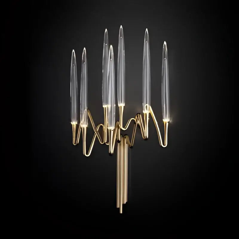 Gold-toned decorbites crystal branch wall sconce with seven clear glass candle arms for elegant dining room lighting