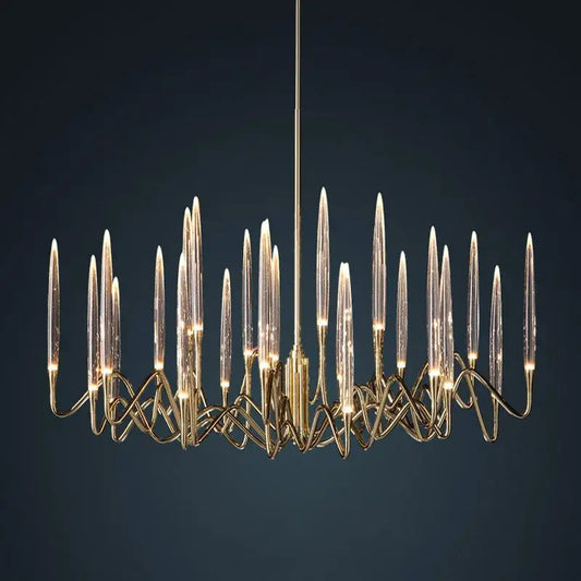 Gold-toned decorbites crystal branch chandelier with slender glass arms and intricate metalwork for dining room lighting