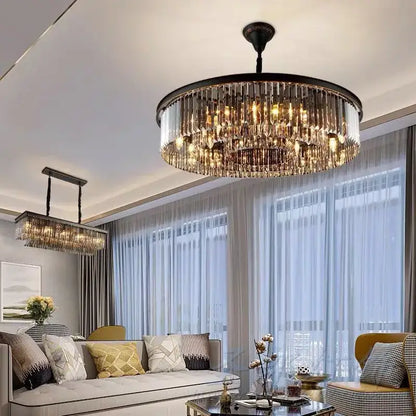 A decorbites crystal ceiling chandelier with a black metal frame and cascading clear crystal prisms for living rooms