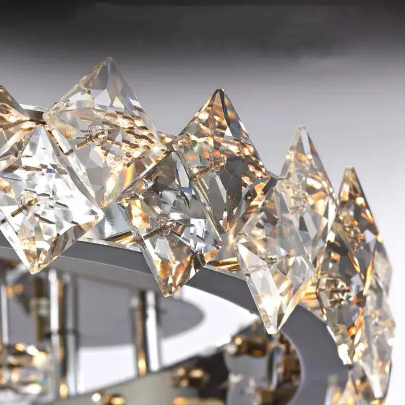 A modern decorbites crystal ceiling lamp with clear faceted crystal prisms arranged in an elegant arc