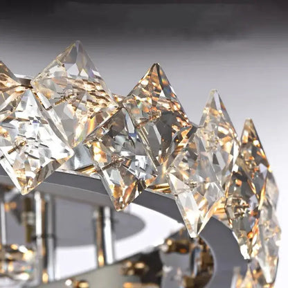 A modern decorbites crystal ceiling lamp with clear faceted crystal prisms arranged in an elegant arc