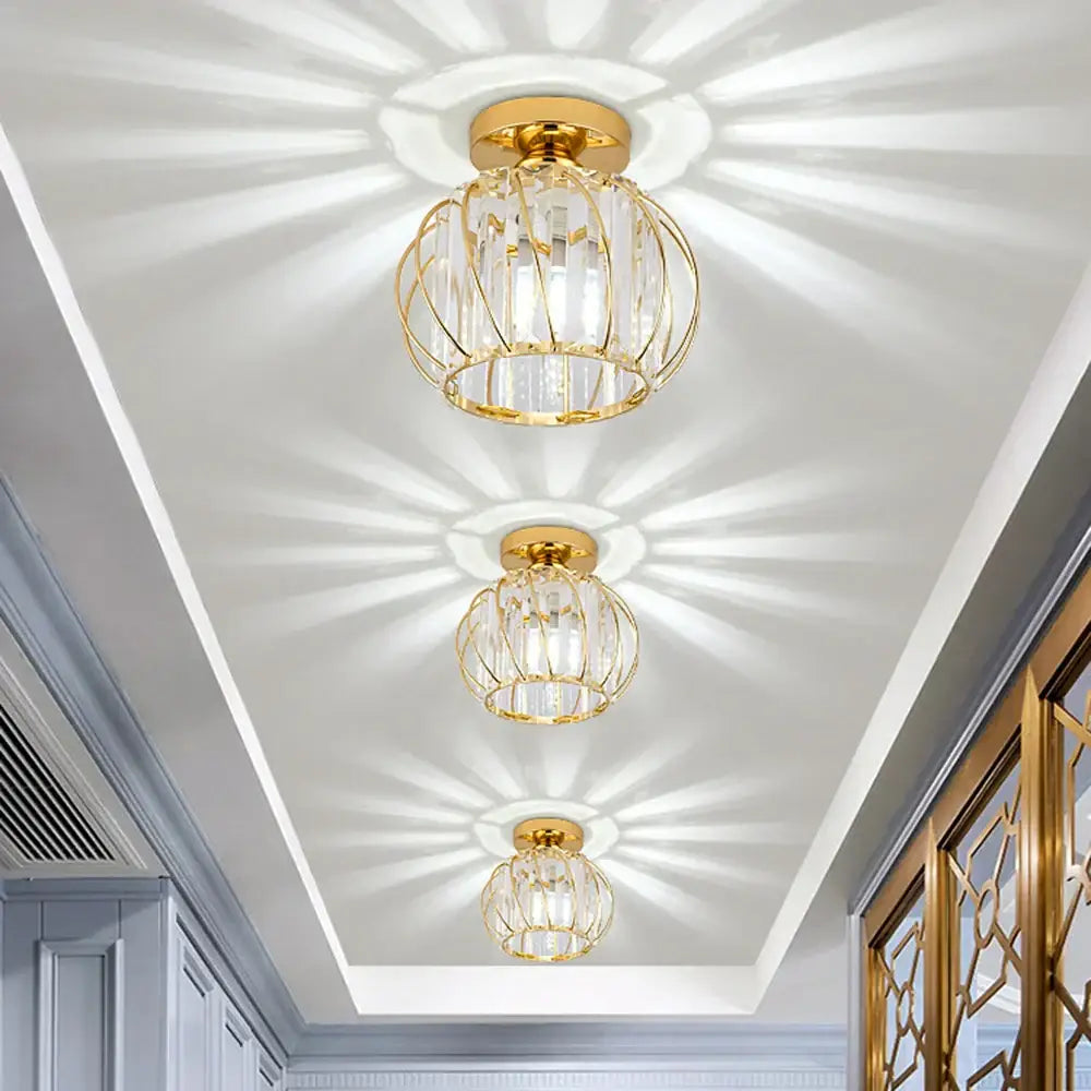Gold-finished decorbites crystal ceiling lamp with cage design and clear crystal accents for elegant home decor