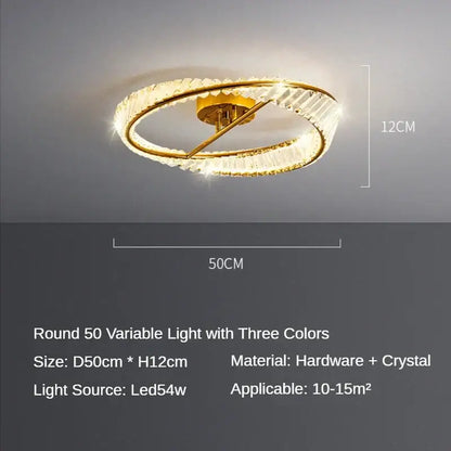 Gold-toned decorbites crystal ceiling lamp with two interlocking rings, clear crystals, and LED lighting for dining room