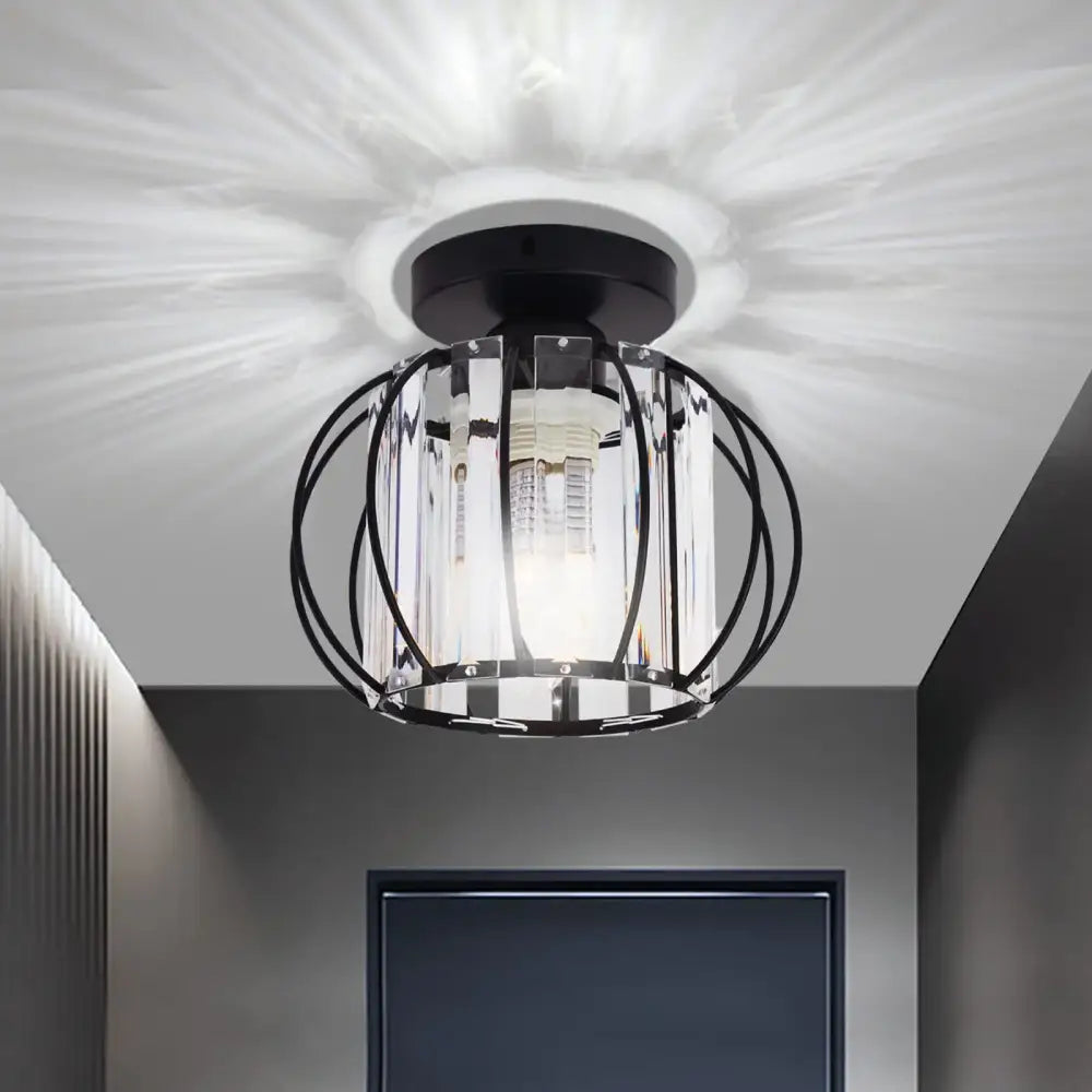 Black metal DecorBites crystal ceiling light with clear crystal accents and warm diffused glow chandelier fixture