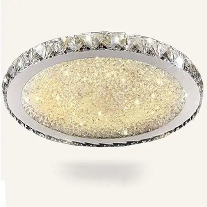 Decorbites crystal ceiling light with oval chrome frame, sparkling gold center, and faceted clear crystals for living rooms