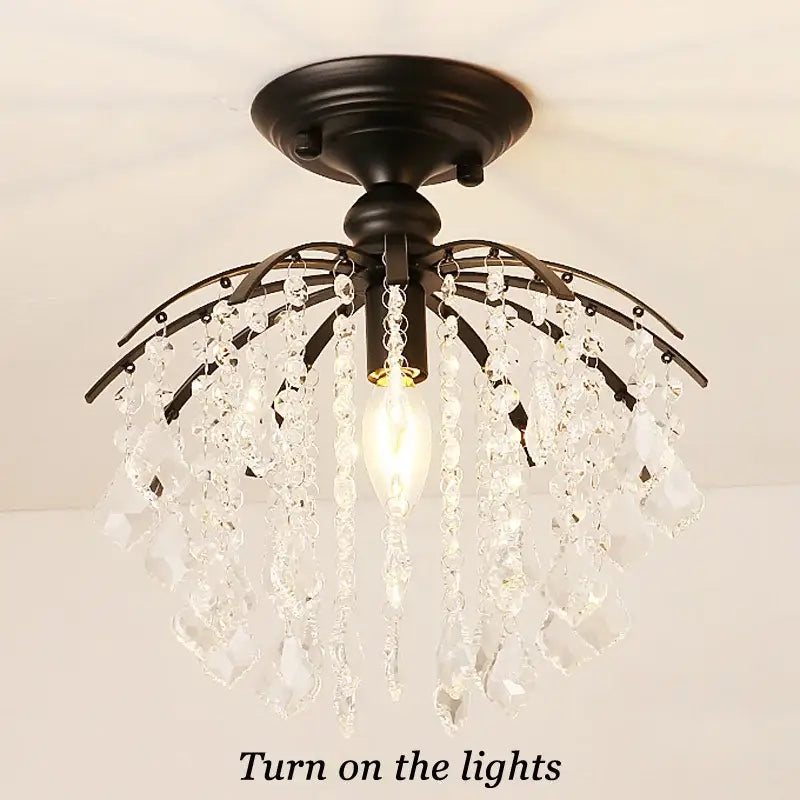 Black metal DecorBites crystal ceiling light with cascading clear crystal droplets for luxury modern home spaces