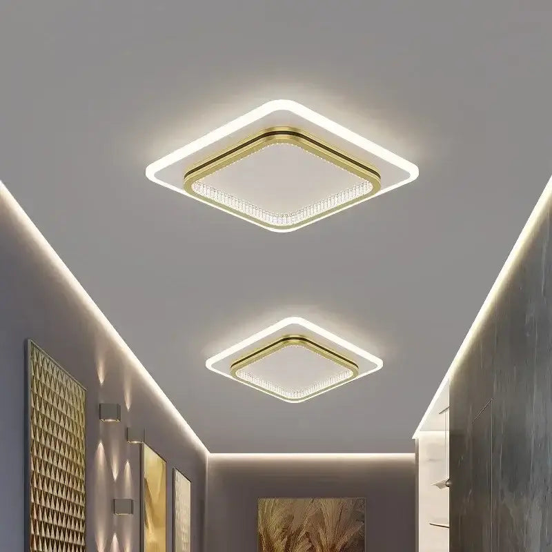 Modern square DecorBites™ crystal ceiling light with gold trim, LED edge, and clear crystal accents for home entrance