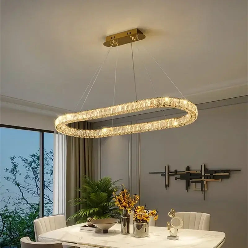 Gold-toned DecorBites crystal ceiling dimmable oval chandelier with sparkling crystal-encrusted frame for living room