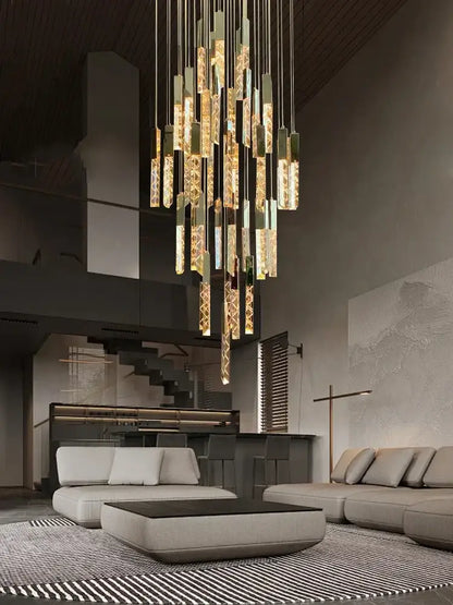 A modern decorbites crystal ceiling pendant light with cascading golden glass rods and metallic accents in circular design