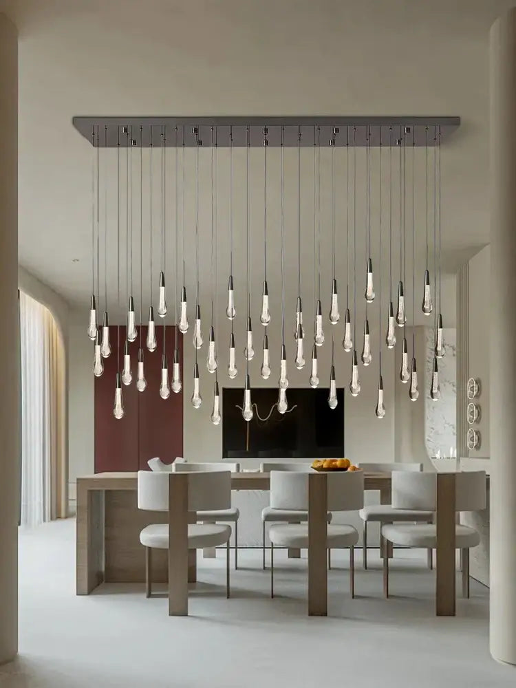 Modern minimalist decorbites crystal ceiling pendant lights with clear glass bulbs on metallic bar for dining room luxury lighting
