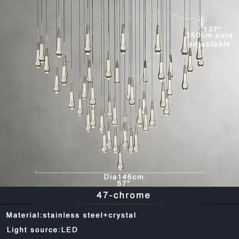 A modern decorbites crystal ceiling pendant light with 47 chrome teardrop crystals on stainless steel cords for dining room