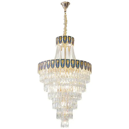 Elegant decorbites crystal chandelier with multi-tiered cascading clear crystal prisms and blue gold enamel accents for luxury spaces