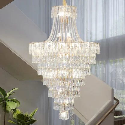 DecorBites crystal chandelier with cascading clear glass prisms and gold-toned accents for luxury living spaces