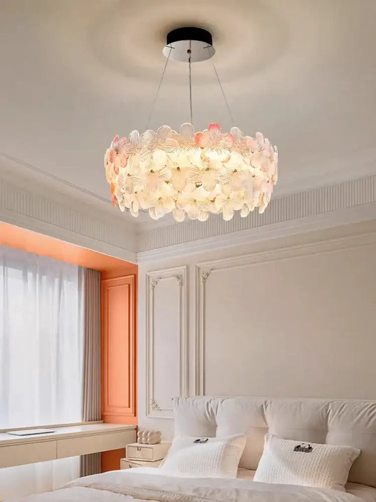 A delicate decorbites crystal chandelier ceiling light with pink and white petal glass for living room and hotel use