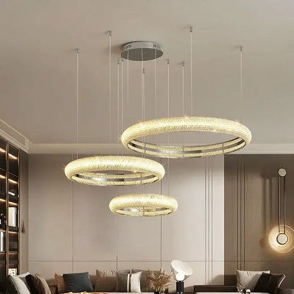 Modern luxury decorbites crystal chandelier with tiered circular rings and sparkling crystals in chrome finish ceiling mount
