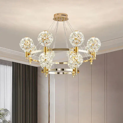 Gold-toned decorbites crystal chandelier with multiple crystal globe lights in dandelion design for luxe living spaces