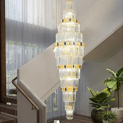 Decorbites crystal chandelier multi-tiered with gold accents and blue gemstones luxury contemporary light fixture