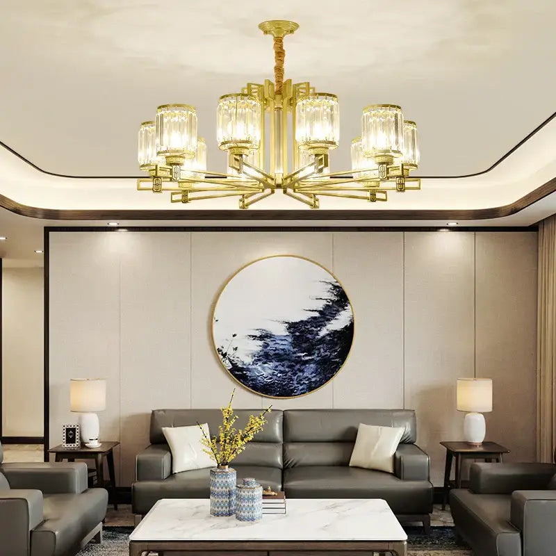 Gold-toned decorbites crystal chandelier with clear glass shades and geometric design for elegant living spaces