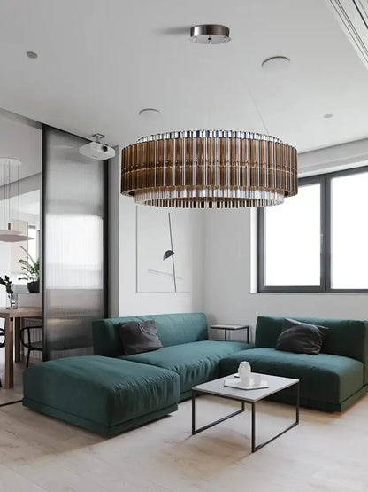 A decorbites crystal chandelier with a metallic bronze finish and vertical slats for elegant living room décor