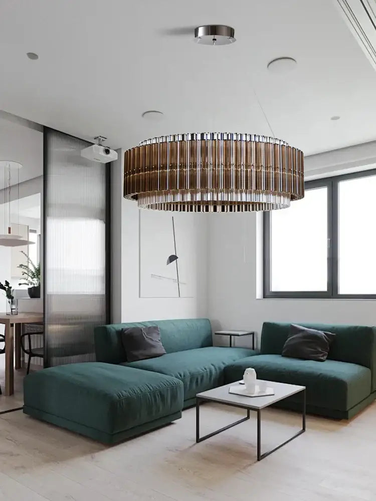 A decorbites crystal chandelier with a metallic bronze finish and vertical slats for elegant living room décor