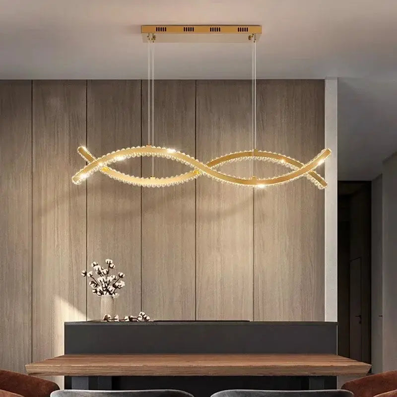 Gold-toned DecorBites crystal chandelier pendant light with sleek double-loop design and sparkling crystal accents for elegant rooms