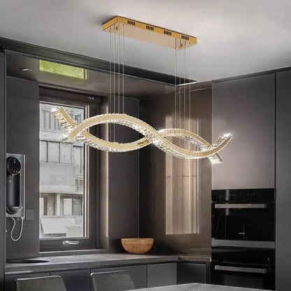 A modern gold-toned decorbites crystal chandelier pendant light with sleek intertwined design for dining and living rooms