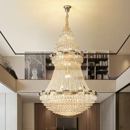 A decorbites crystal chandelier with gold-toned metal frame and cascading clear crystals for elegant luxury lighting