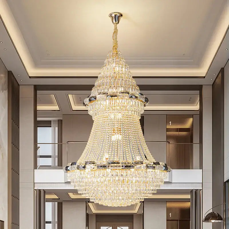 Decorbites crystal chandelier with gold-toned frame and cascading clear crystals for elegant living room lighting