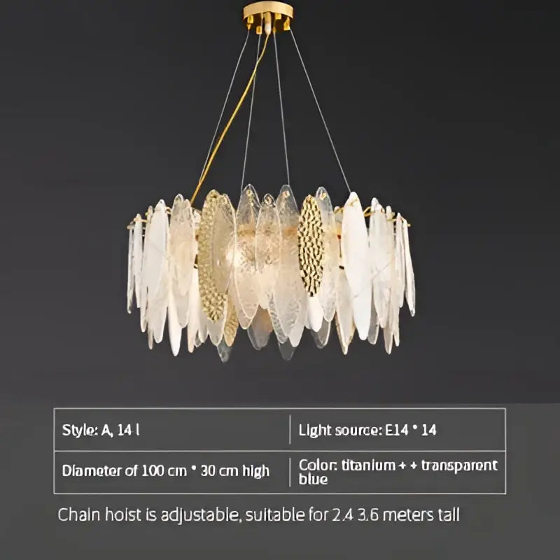 Gold-toned decorbites crystal chandelier with translucent blue and clear crystal discs in elegant european style