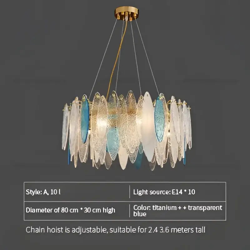 A decorbites crystal chandelier with a gold metal frame and blue glass shards in elegant european style design
