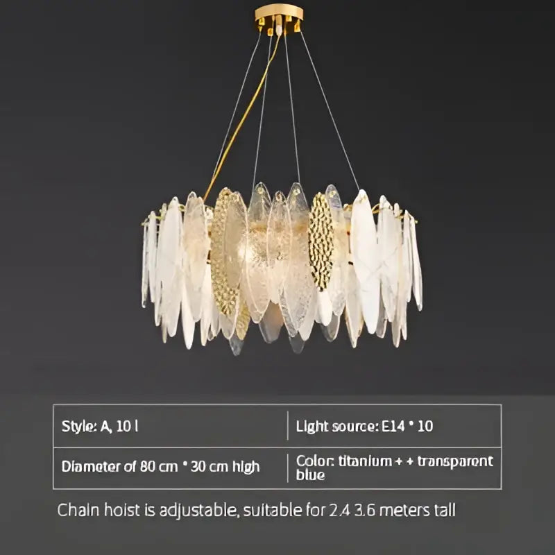 Gold-toned decorbites crystal chandelier with translucent blue and clear leaf-shaped shades in european style design